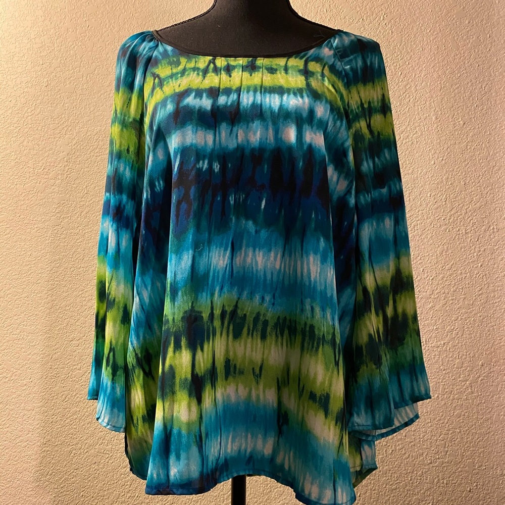 Flowy blouse criss cross detail on back